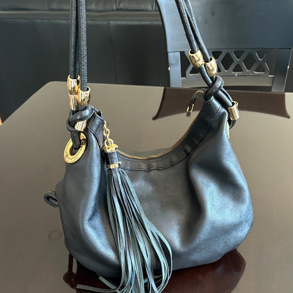 Chic Black Leather Shoulder Bag with Gold Accents